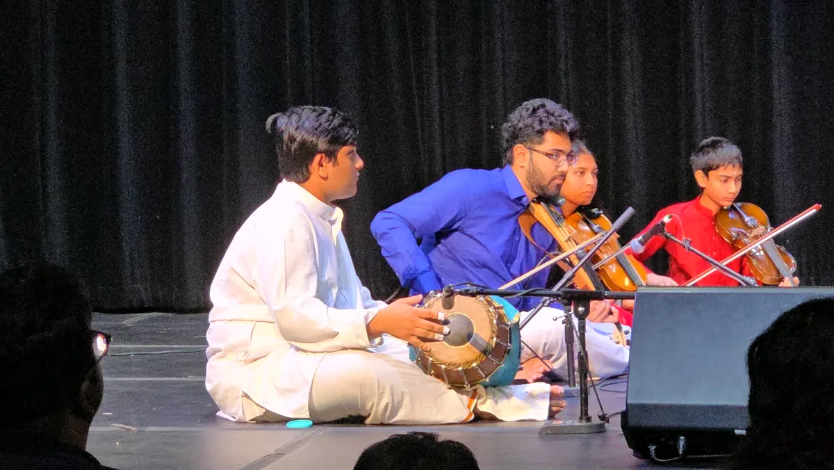 Ensemble on dark stage