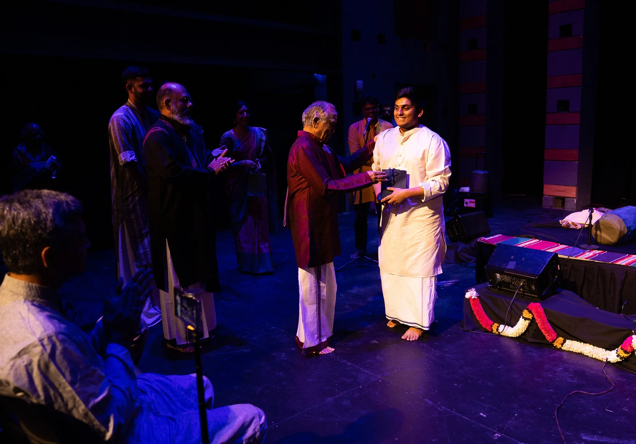 IFAA DFW Nirantara — receiving recognition on stage